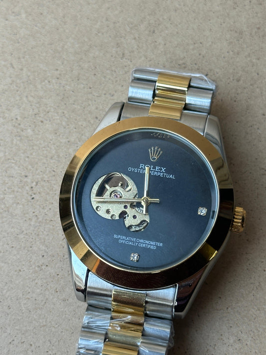 Rolex Oyster Perpetual watch with a two-tone stainless steel and gold-colored